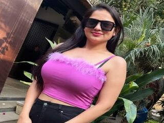 cam girl playing with vibrator PeachyGlow